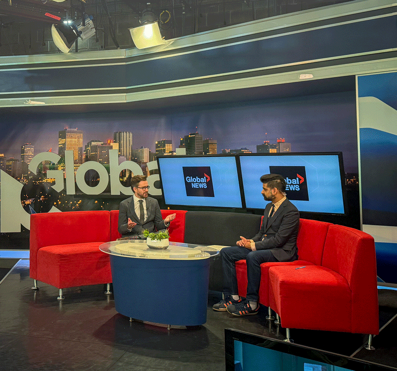 Legal Aid Alberta criminal duty counsel Cameron Mitchell sits in studio with Vinesh Pratap of Global Edmonton.