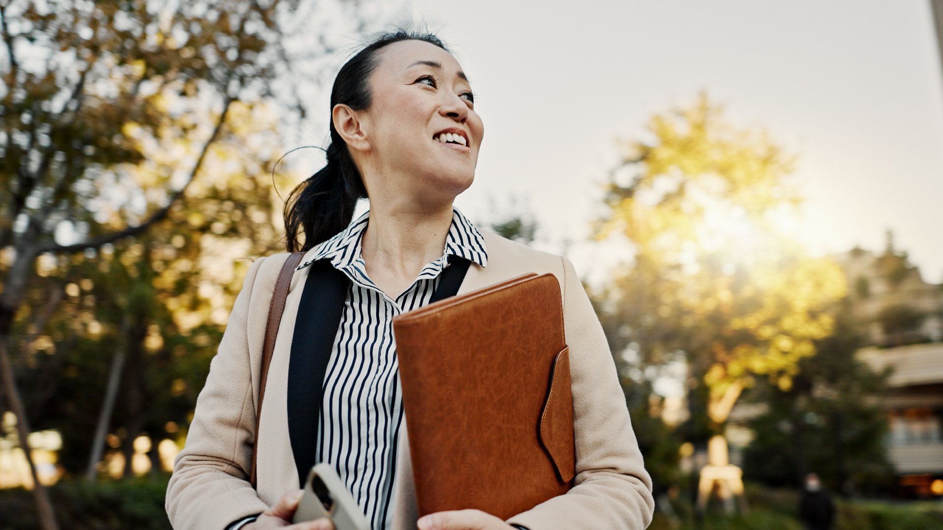 Professional, corporate lawyer and worker with file, documents and phone for career