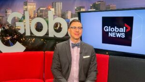 Paul Welke sitting on Global Edmonton couch